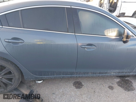 2021 Mazda 6 Carbon Edition with VIN JM1GL1WY9M1619981, listed as a IAAI auction lot 41751194 with 32,083 mi miles and . Bid and sale history available at DreamBid. Image 13.