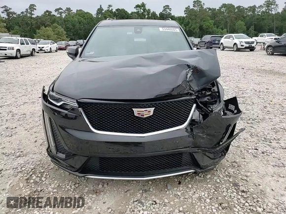 2023 Cadillac XT6 AWD Sport z VIN 1GYKPGRS6PZ126039, wystawiony jako Copart lot #55948605 z przebiegiem 39 966 mil mil oraz Szkoda całkowita • Salvage title. Historia ofert i sprzedaży dostępna na DreamBid. Obrazek 14.