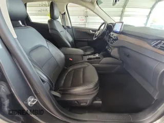 2020 Ford Escape Titanium Hybrid with VIN 1FMCU0DZ2LUB82013, listed as a IAAI auction lot 42727391 with 92,623 mi miles and . Bid and sale history available at DreamBid. Image 15.