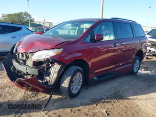 2014 Toyota Sienna XLE with VIN 5TDYK3DCXES473671, listed as a IAAI auction lot 42243030 with 70,052 mi miles and . Bid and sale history available at DreamBid. Image 17.