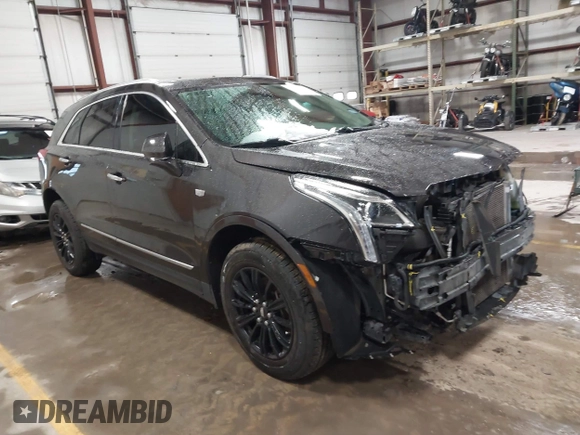 2018 Cadillac XT5 Luxury FWD with VIN 1GYKNCRS8JZ184322, listed as a IAAI auction lot 41225319 with 97,729 mi miles and . Bid and sale history available at carsss.com. Image 1.
