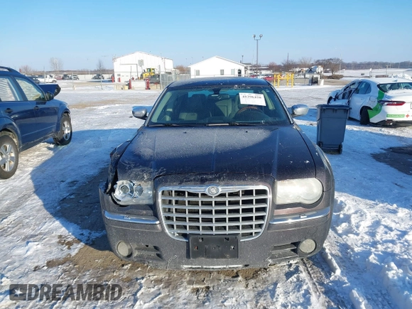 2005 Chrysler 300 with VIN 2C3AA63H65H526016, listed as a IAAI auction lot 41296420 with 136,794 mi miles. Bid and sale history available at carsss.com. Image 12.