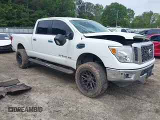 2017 Nissan Titan Pro-4X z VIN 1N6BA1F45HN509292, wystawiony jako IAAI lot #42201802 z przebiegiem 157 000 mil mil oraz . Historia ofert i sprzedaży dostępna na DreamBid. Obrazek 1.