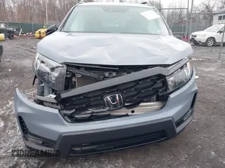 2022 Honda Passport Elite z VIN 5FNYF8H06NB015583, wystawiony jako IAAI lot #41633925 z przebiegiem 49 738 mil mil oraz . Historia ofert i sprzedaży dostępna na DreamBid. Obrazek 6.