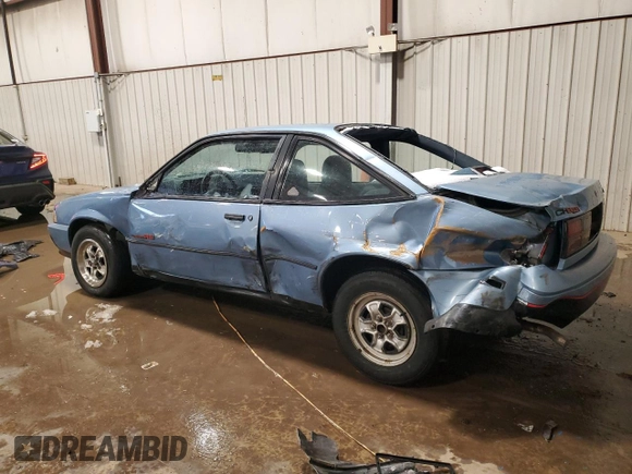 1989 Chevrolet Cavalier with VIN 1G1JC1113KJ278292, listed as a Copart auction lot 44942375 with 85,604 mi miles and Salvage Title. Bid and sale history available at DreamBid. Image 2.