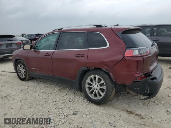 2019 Jeep Cherokee Latitude with VIN 1C4PJLCB0KD203797, listed as a Copart auction lot 51386735 with 127,924 mi miles and Salvage Title. Bid and sale history available at carsss.com. Image 2.