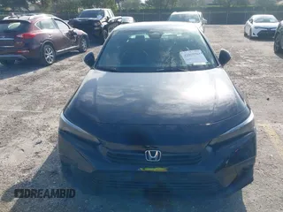 2024 Honda Civic Sport z VIN 2HGFE2F52RH596586, wystawiony jako IAAI lot #42008964 z przebiegiem 7 831 mil mil oraz . Historia ofert i sprzedaży dostępna na DreamBid. Obrazek 6.