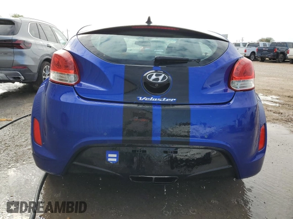 2012 Hyundai Veloster w/Red Int z VIN KMHTC6AD2CU048049, wystawiony jako Copart lot #85809854 z przebiegiem 122 914 mil mil oraz Szkoda całkowita • Salvage title. Historia ofert i sprzedaży dostępna na DreamBid. Obrazek 6.