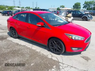 2016 Ford Focus SE z VIN 1FADP3F23GL222764, wystawiony jako IAAI lot #42553326 z przebiegiem 151 275 mil mil oraz . Historia ofert i sprzedaży dostępna na DreamBid. Obrazek 1.