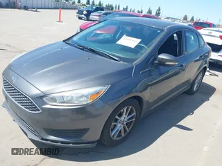 2017 Ford Focus SE z VIN 1FADP3F26HL308880, wystawiony jako IAAI lot #41991909 z przebiegiem 103 403 mil mil oraz . Historia ofert i sprzedaży dostępna na DreamBid. Obrazek 2.