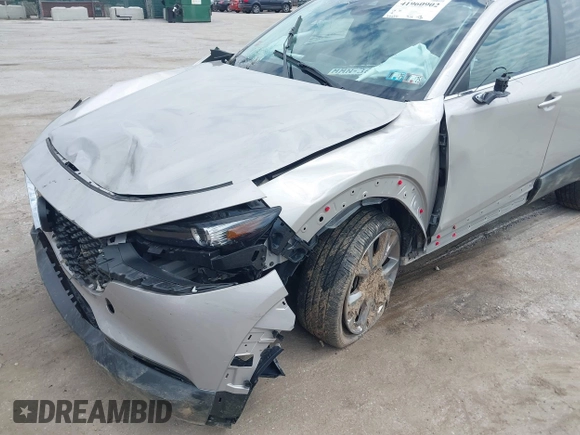 2022 Mazda CX-30 S Select z VIN 3MVDMBBL2NM439681, wystawiony jako IAAI lot #41960902 z przebiegiem 22 730 mil mil oraz . Historia ofert i sprzedaży dostępna na DreamBid. Obrazek 6.