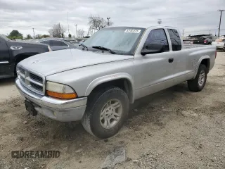 2003 Dodge Dakota SLT z VIN 1D7HL42X53S358463, wystawiony jako Copart lot #53702375 z przebiegiem 223 178 mil mil oraz Szkody całkowita. Historia ofert i sprzedaży dostępna na DreamBid. Obrazek 1.