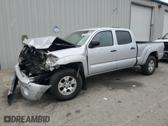 2010 Toyota Tacoma PreRunner with VIN 3TMKU4HN4AM025390, listed as a Copart auction lot 50242825 with 450,676 mi miles and Salvage title. Bid and sale history available at DreamBid. Image 1.