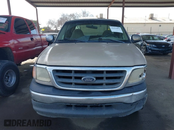 2000 Ford F-150 XL with VIN 1FTZX1723YKB48613, listed as a IAAI auction lot 41611851 with 187,450 mi miles. Bid and sale history available at carsss.com. Image 12.