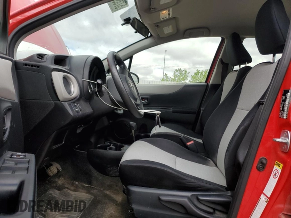 2012 Toyota Yaris L with VIN JTDKTUD32CD517695, listed as a Copart auction lot 57392355 with 201,711 mi miles and Salvage title. Bid and sale history available at DreamBid. Image 7.