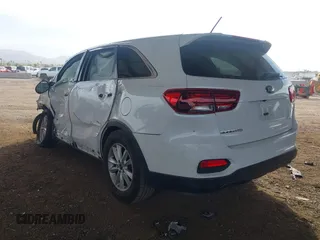 2019 Kia Sorento LX z VIN 5XYPG4A36KG611142, wystawiony jako IAAI lot #41275270 z przebiegiem 97 421 mil mil oraz . Historia ofert i sprzedaży dostępna na DreamBid. Obrazek 3.