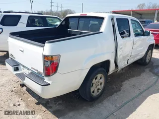 2007 Honda Ridgeline RTL w/Leather with VIN 2HJYK16547H529037, listed as a IAAI auction lot 41763786 with 195,240 mi miles. Bid and sale history available at carsss.com. Image 4.