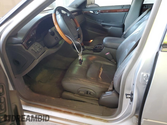 2002 Cadillac DeVille DTS with VIN 1G6KF57952U303332, listed as a Copart auction lot 61852523 with 173,500 mi miles and Clean Title. Bid and sale history available at carsss.com. Image 7.