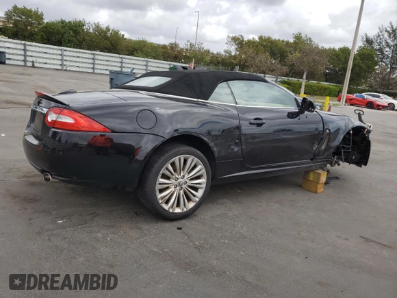 2011 Jaguar XK with VIN SAJWA4GB0BLB38875, listed as a Copart auction lot 52045805 with 35,487 mi miles and Salvage Title. Bid and sale history available at carsss.com. Image 3.
