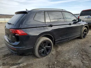 2023 Volkswagen Tiguan SE R-Line Black with VIN 3VVCB7AX9PM131559, listed as a Copart auction lot 44711665 with 28,166 mi miles and Salvage Title. Bid and sale history available at carsss.com. Image 3.