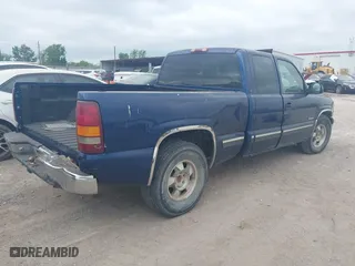 2000 Chevrolet Silverado 1500 LS with VIN 2GCEC19T8Y1156870, listed as a IAAI auction lot 42057588 with 306,580 mi miles. Bid and sale history available at carsss.com. Image 4.