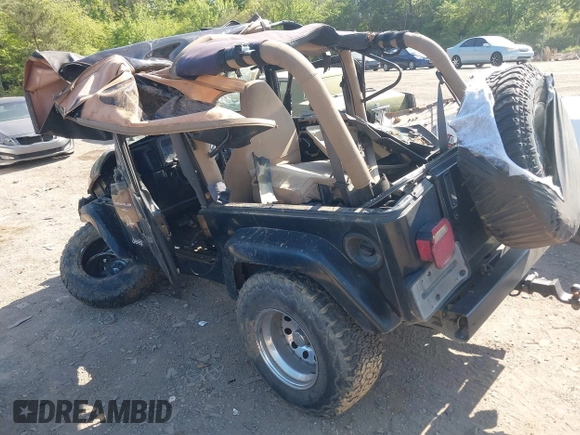 1999 Jeep Wrangler Sahara with VIN 1J4FY49S2XP466068, listed as a IAAI auction lot 42062789 with Not provided miles and . Bid and sale history available at DreamBid. Image 3.