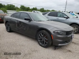 2019 Dodge Charger SXT with VIN 2C3CDXBG2KH670415, listed as a Copart auction lot 51668255 with 60,776 mi miles and Clean Title. Bid and sale history available at carsss.com. Image 4.