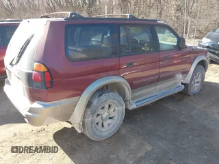 2000 Mitsubishi Montero Sport LS with VIN JA4MT31H8YP047756, listed as a IAAI auction lot 41704702 with 165,343 mi miles. Bid and sale history available at carsss.com. Image 4.