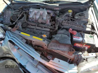 2002 Nissan Maxima GLE z VIN JN1DA31A92T302785, wystawiony jako Copart lot #57310725 z przebiegiem 95 192 mil mil oraz Szkoda całkowita • Salvage title. Historia ofert i sprzedaży dostępna na DreamBid. Obrazek 11.