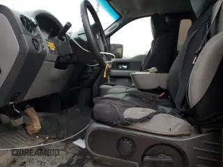 2007 Ford F-150 XL with VIN 1FTRF12257KC92124, listed as a Copart auction lot 50627995 with 142,316 mi miles and Salvage title. Bid and sale history available at DreamBid. Image 7.