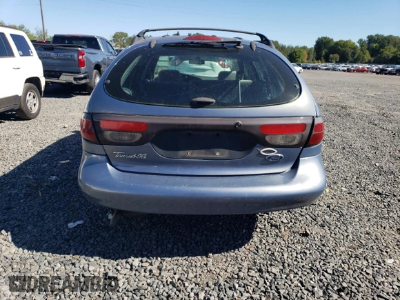 1999 Ford Taurus SE Standard with VIN 1FAFP58U9XG271897, listed as a Copart auction lot 73048784 with 190,518 mi miles and Salvage title. Bid and sale history available at DreamBid. Image 6.