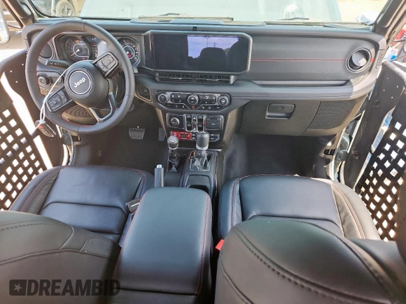 2024 Jeep Wrangler Rubicon X with VIN 1C4RJXFGXRW247781, listed as a Copart auction lot 64393745 with 2,661 mi miles and Salvage title. Bid and sale history available at DreamBid. Image 8.