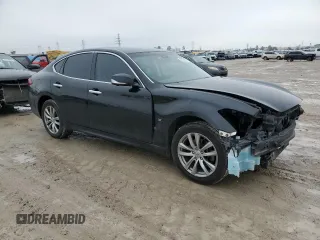 2018 Infiniti Q70 Luxe with VIN JN1BY1ARXJM220246, listed as a Copart auction lot 43276115 with 133,292 mi miles and Salvage title. Bid and sale history available at DreamBid. Image 4.