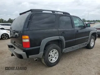 2003 Chevrolet Tahoe Z71 z VIN 1GNEK13Z13R301464, wystawiony jako Copart lot #53905395 z przebiegiem 165 360 mil mil oraz Szkoda całkowita • Salvage title. Historia ofert i sprzedaży dostępna na DreamBid. Obrazek 3.