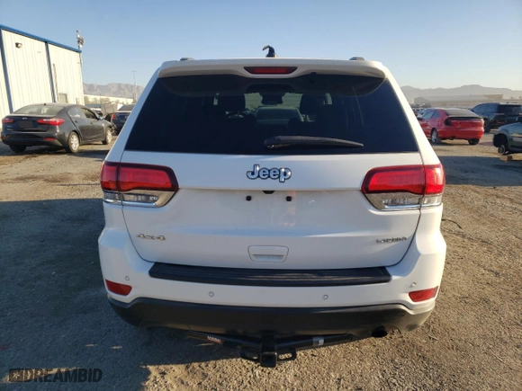2021 Jeep Grand Cherokee Laredo X with VIN 1C4RJFAG2MC569455, listed as a Copart auction lot 66375044 with 57,943 mi miles and Salvage Title. Bid and sale history available at carsss.com. Image 6.