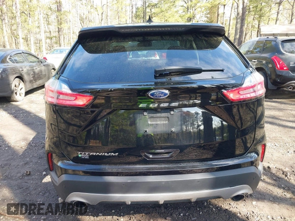 2022 Ford Edge Titanium with VIN 2FMPK4K95NBB06151, listed as a IAAI auction lot 41932545 with 57,762 mi miles and . Bid and sale history available at DreamBid. Image 16.