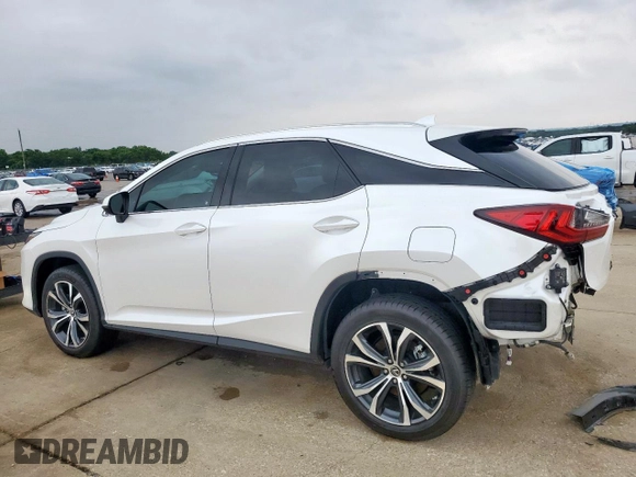 2022 Lexus RX 350 с VIN 2T2HZMAAXNC237028, выставлен на аукционе Copart как лот 57129145 с пробегом 38 852 миль миль и Списание • Salvage title. История ставок и продаж доступна на DreamBid. Изображение 2.