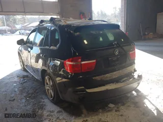 2007 BMW X5 3.0si with VIN 5UXFE43597L019227, listed as a IAAI auction lot 41387624 with 1 mi miles. Bid and sale history available at carsss.com. Image 3.
