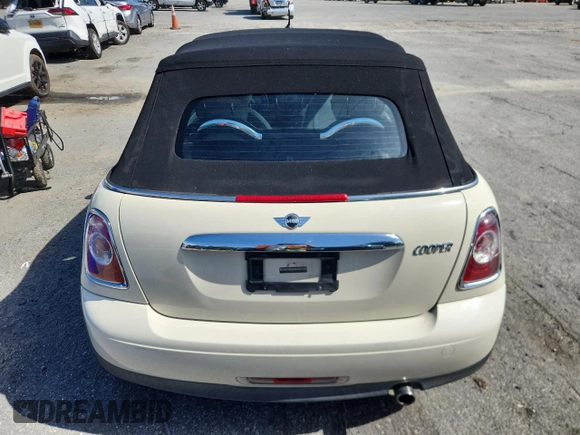 2011 MINI Convertible with VIN WMWZN3C59BTZ78433, listed as a Copart auction lot 65509575 with 102,800 mi miles and Clean title. Bid and sale history available at DreamBid. Image 6.