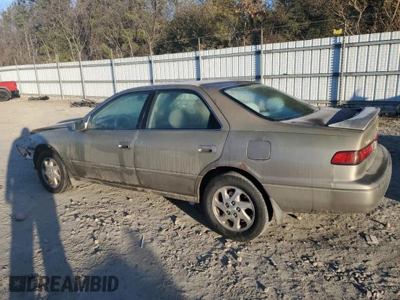 1999 Toyota Camry LE z VIN JT2BF22K0X0167589, wystawiony jako Copart lot #42699015 z przebiegiem 198 634 mil mil oraz Czysty tytuł • Clean title. Historia ofert i sprzedaży dostępna na DreamBid. Obrazek 2.