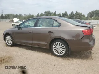 2012 Volkswagen Jetta SEL with VIN 3VWLP7AJ1CM301674, listed as a Copart auction lot 59000735 with 118,308 mi miles and Salvage title. Bid and sale history available at DreamBid. Image 2.