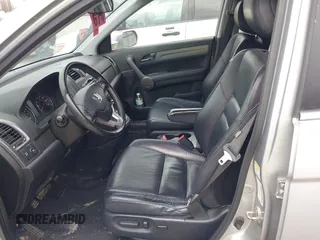 2009 Honda CR-V EX-L with VIN JHLRE487X9C021566, listed as a IAAI auction lot 42008321 with 128,647 mi miles and . Bid and sale history available at carsss.com. Image 5.