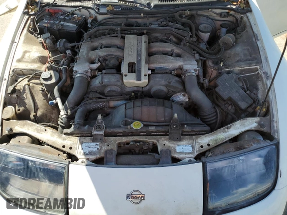 1991 Nissan 300ZX z VIN JN1RZ26H3MX504127, wystawiony jako Copart lot #74052424 z przebiegiem 48 904 mil mil oraz Szkody całkowita. Historia ofert i sprzedaży dostępna na DreamBid. Obrazek 11.