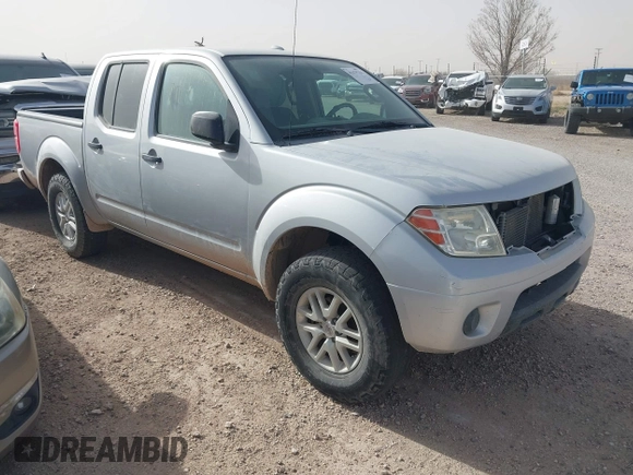 2014 Nissan Frontier SV with VIN 1N6AD0ER0EN759772, listed as a IAAI auction lot 41479252 with 153,630 mi miles and . Bid and sale history available at DreamBid. Image 1.