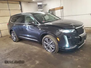 2023 Cadillac XT6 AWD Premium Luxury z VIN 1GYKPDRS0PZ209335, wystawiony jako Copart lot #48555685 z przebiegiem 30 375 mil mil oraz Szkoda całkowita • Salvage title. Historia ofert i sprzedaży dostępna na DreamBid. Obrazek 4.