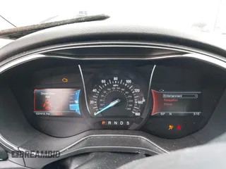 2018 Ford Fusion Titanium z VIN 3FA6P0K9XJR160993, wystawiony jako IAAI lot #41938148 z przebiegiem 137 410 mil mil oraz . Historia ofert i sprzedaży dostępna na DreamBid. Obrazek 7.