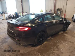 2019 Ford Fusion SE with VIN 3FA6P0HD3KR229021, listed as a IAAI auction lot 41576389 with 123,286 mi miles. Bid and sale history available at carsss.com. Image 4.