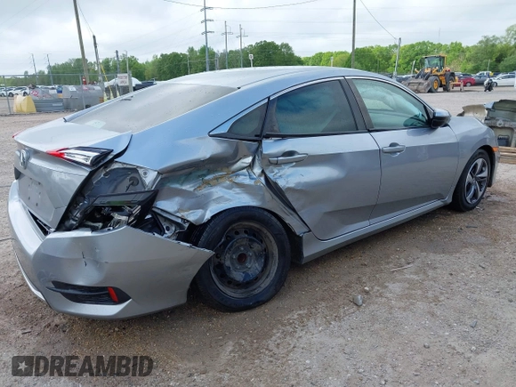 2019 Honda Civic LX with VIN 19XFC2F60KE043806, listed as a IAAI auction lot 41915894 with 123,141 mi miles and . Bid and sale history available at DreamBid. Image 4.