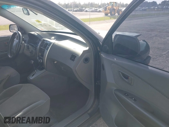 2007 Hyundai Tucson SE with VIN KM8JN12DX7U573823, listed as a IAAI auction lot 41238550 with 79,641 mi miles. Bid and sale history available at carsss.com. Image 5.