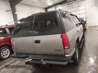 1999 GMC Yukon with VIN 1GKEK13R7XJ723255, listed as a IAAI auction lot 41879617 with 148,324 mi miles. Bid and sale history available at carsss.com. Image 16.